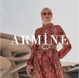 Elegant image of a person in a red floral dress with a beige headscarf and the ARMINE logo, showcasing a sophisticated product ad template enhanced with AI insights for conversion-driven campaigns on Instagram reels and Facebook ads.