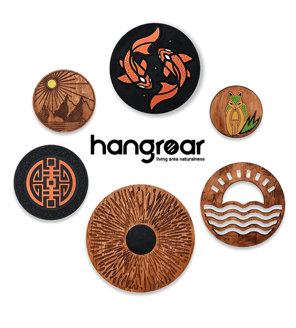 Wooden wall decorations in various designs (eye, sun, sea, owl)
