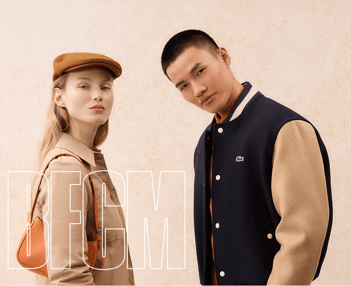 A man and a woman posing in stylish neutral-toned outfits with the text ‘BFCM’ in the background.